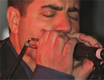 John Jesser on the harmonica
